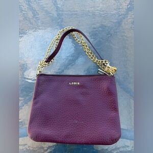 Lodis Plum Pebbled Leather Shoulder Bag with Gold Chain Accent